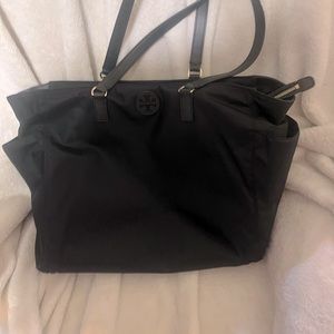 Tory Burch nylon diaper bag with changing pad. Used in good condition.
